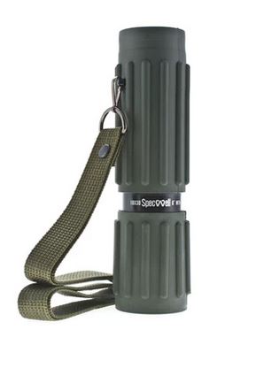 A monocular standing upright with a strap attached. The monocular is army green with long tactile grips for easy use.