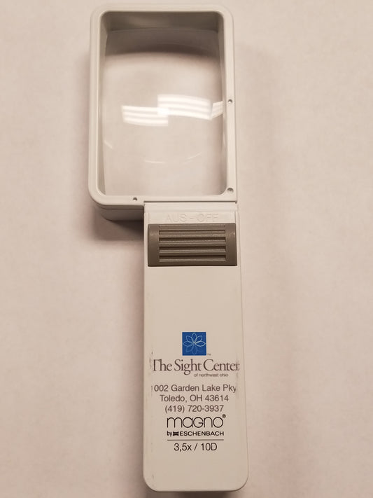 a 3.5x Hand Held Magnifier with the Sight Center Logo, address and phone number