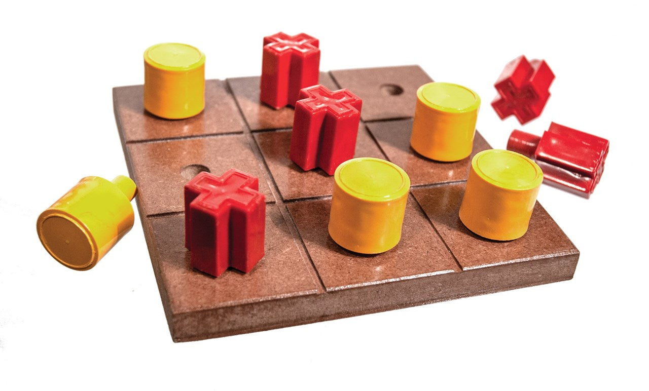 A brown tic tac toe board with tactile red X's and yellow O's